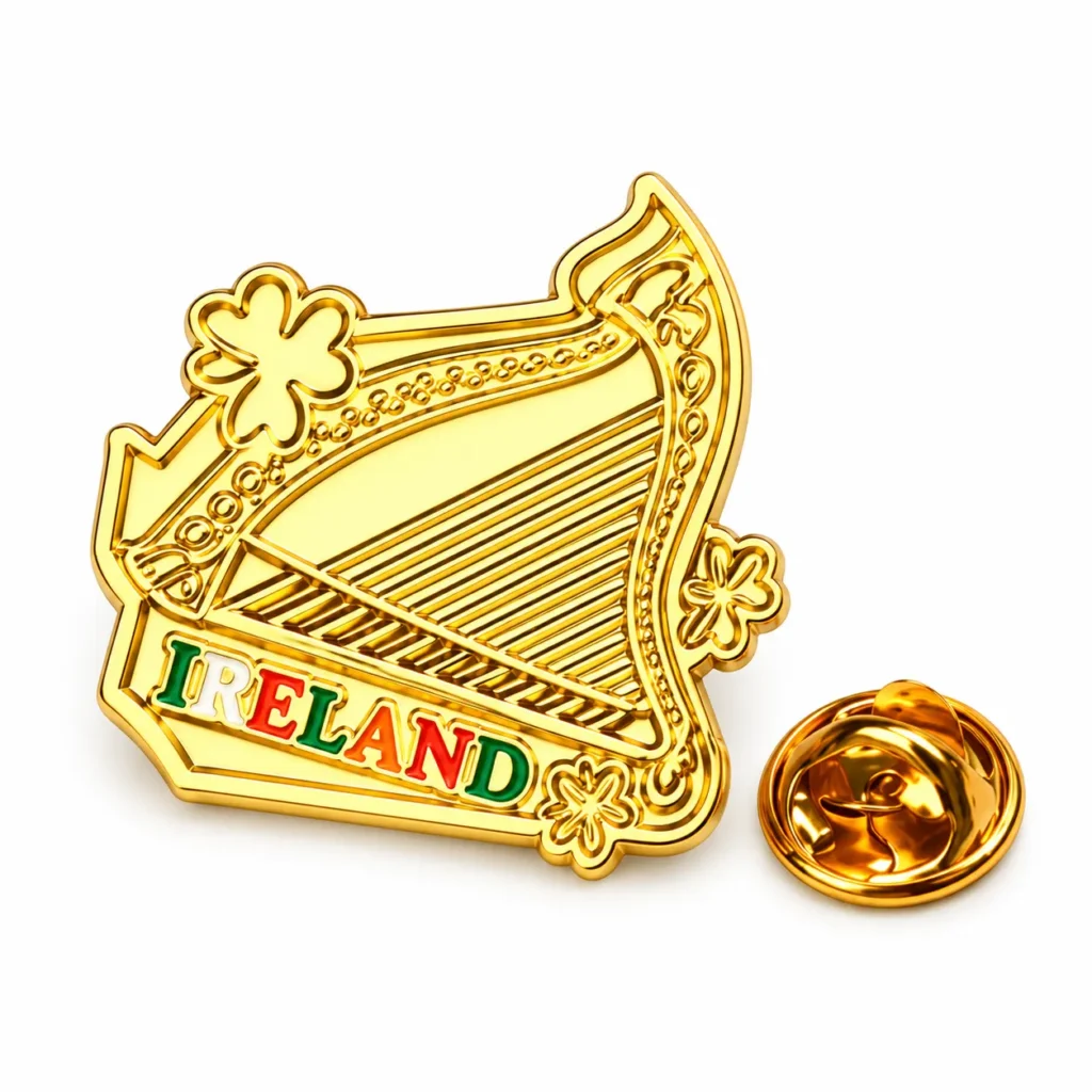 Gold-tone Ireland harp enamel pin with shamrock details, colorful lettering and butterfly clasp