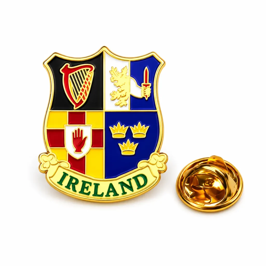 Ireland shield enamel pin with four heraldic panels, green IRELAND lettering and gold-tone butterfly clasp