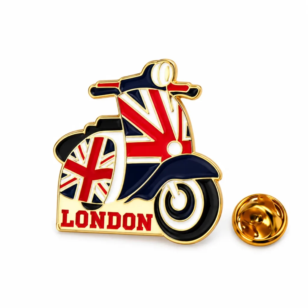 London scooter enamel pin with red, white and navy Union Jack details and gold-tone butterfly clasp