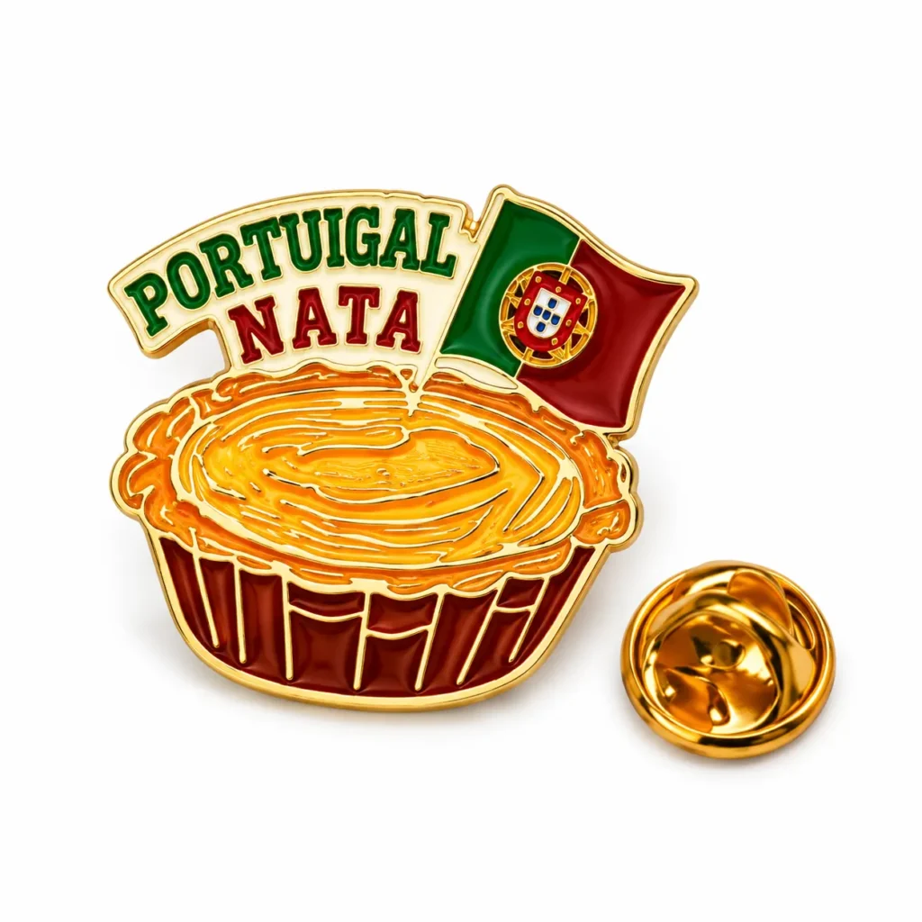 Portugal Nata pastry enamel pin with a Portuguese flag and gold-tone butterfly clasp on a white background