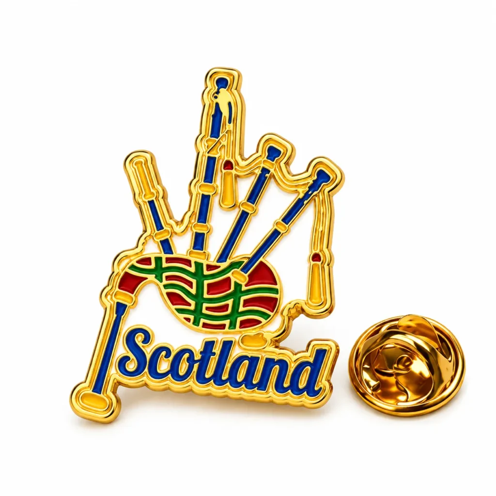 Scotland bagpipes enamel pin with blue pipes, a red-and-green bag and gold-tone butterfly clasp