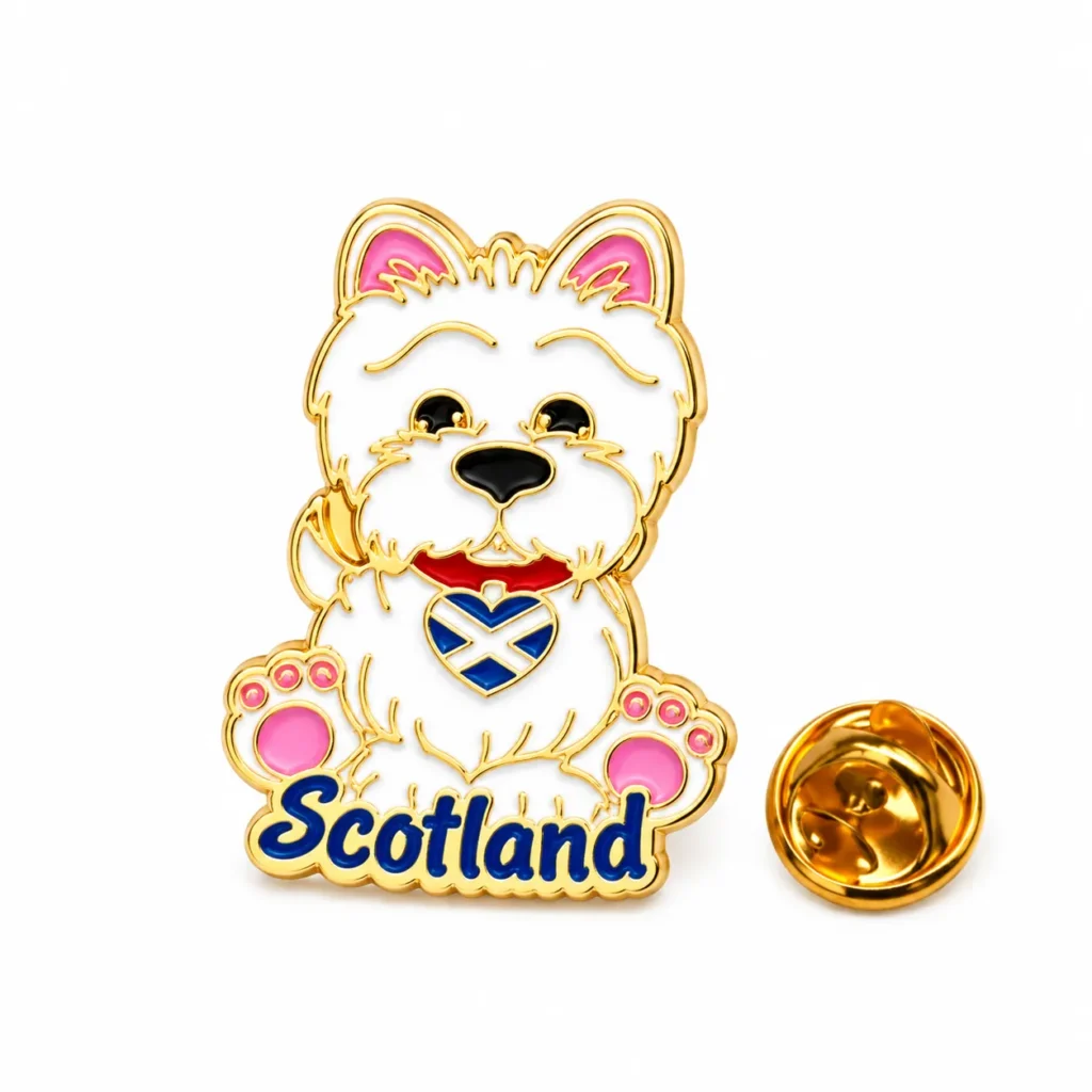 White Scotland dog enamel pin with pink paws, a Saltire heart and gold-tone butterfly clasp on a white background
