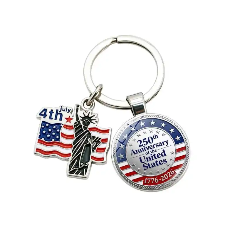 Silver-tone keychain with a 250th Anniversary of the United States medallion and July 4th Statue of Liberty charm